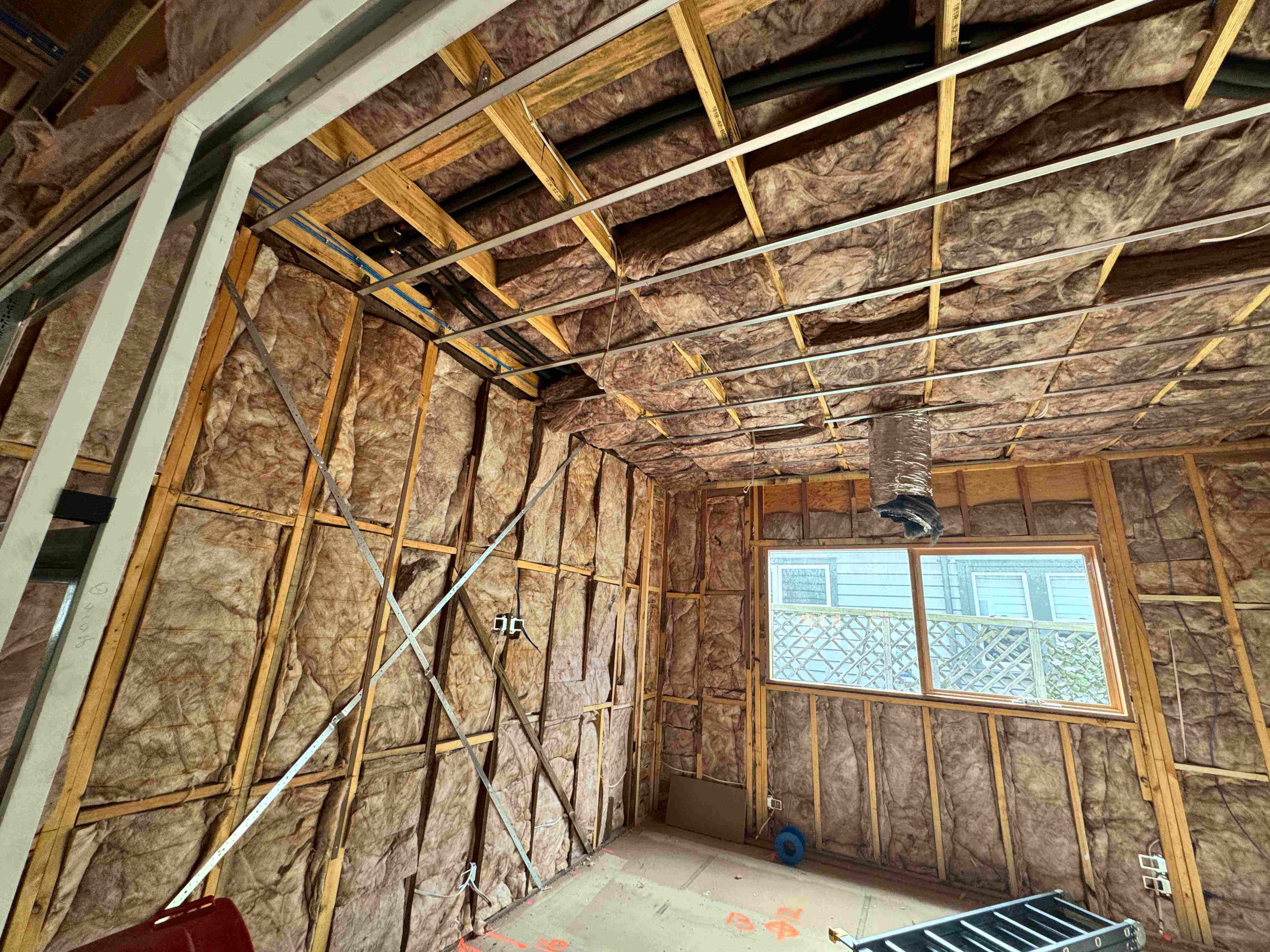 Ceiling insulation installation inside a residential property