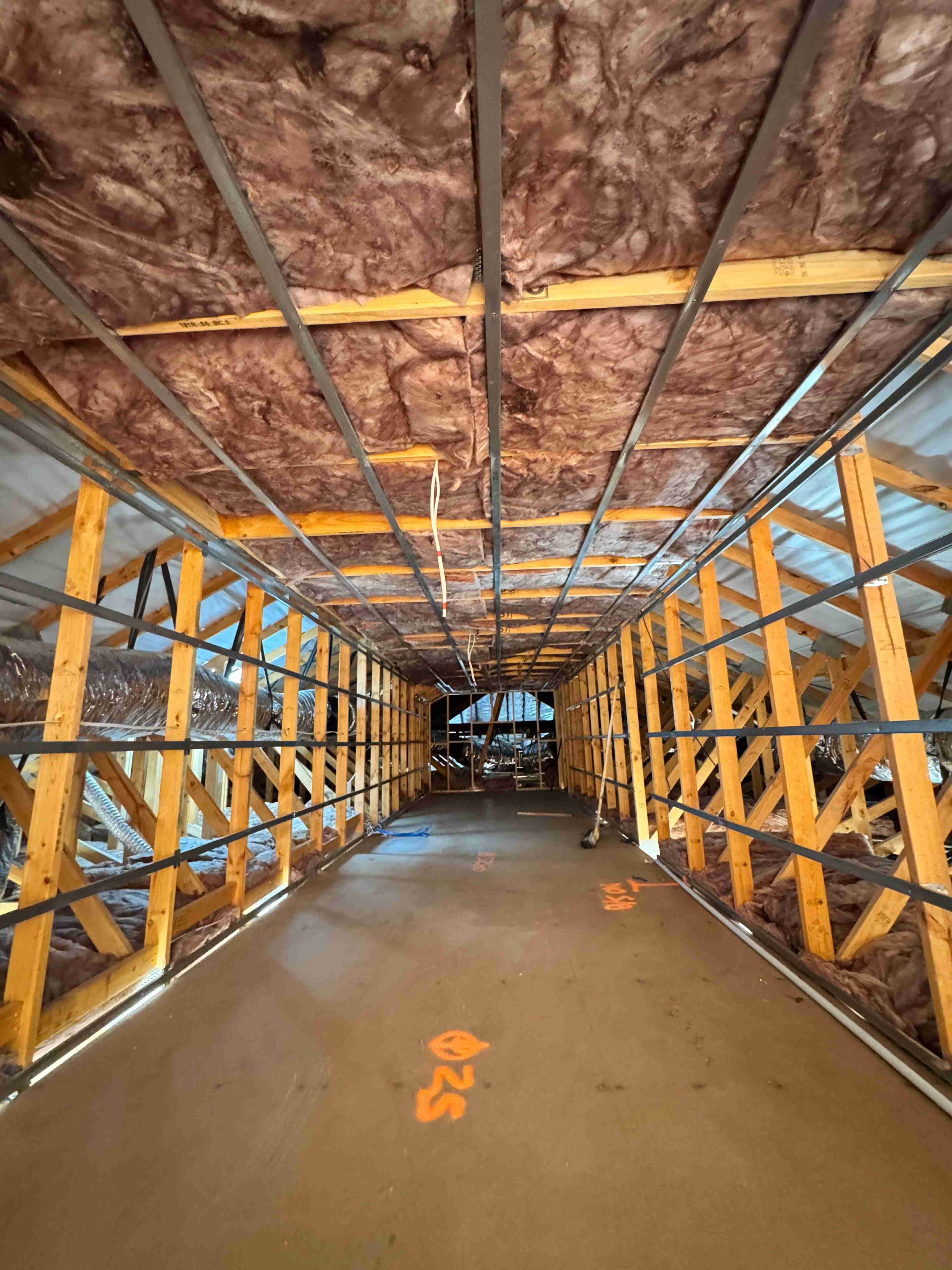 Insulated roof and ceiling framing during a home insulation project